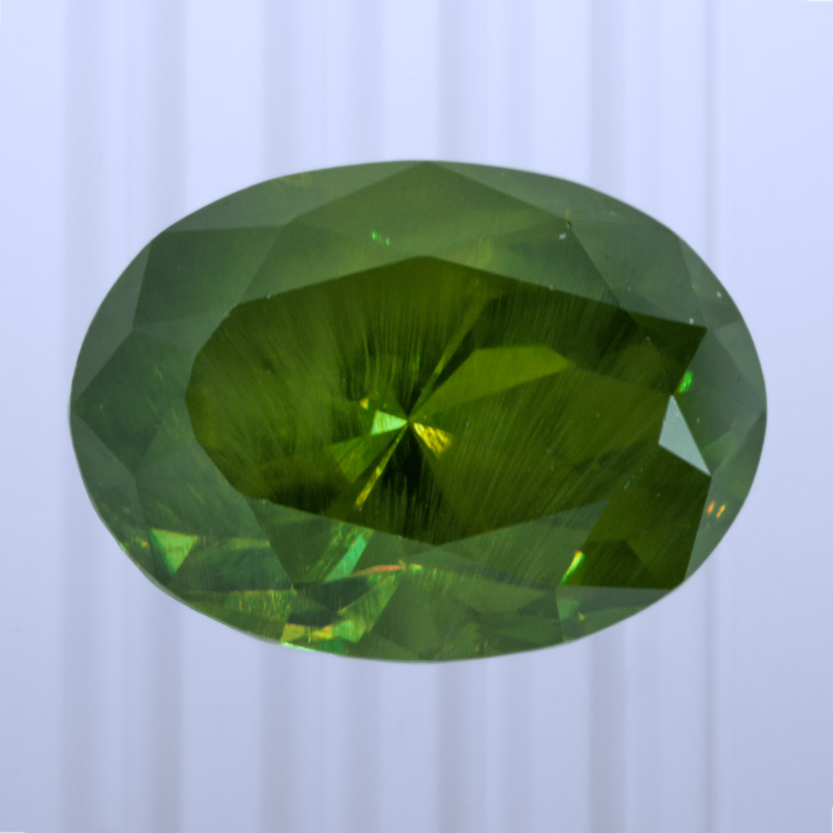 2.76 ct Demantoid, Russia, Unheated/Untreated, Oval Cut, photo 1 of 5