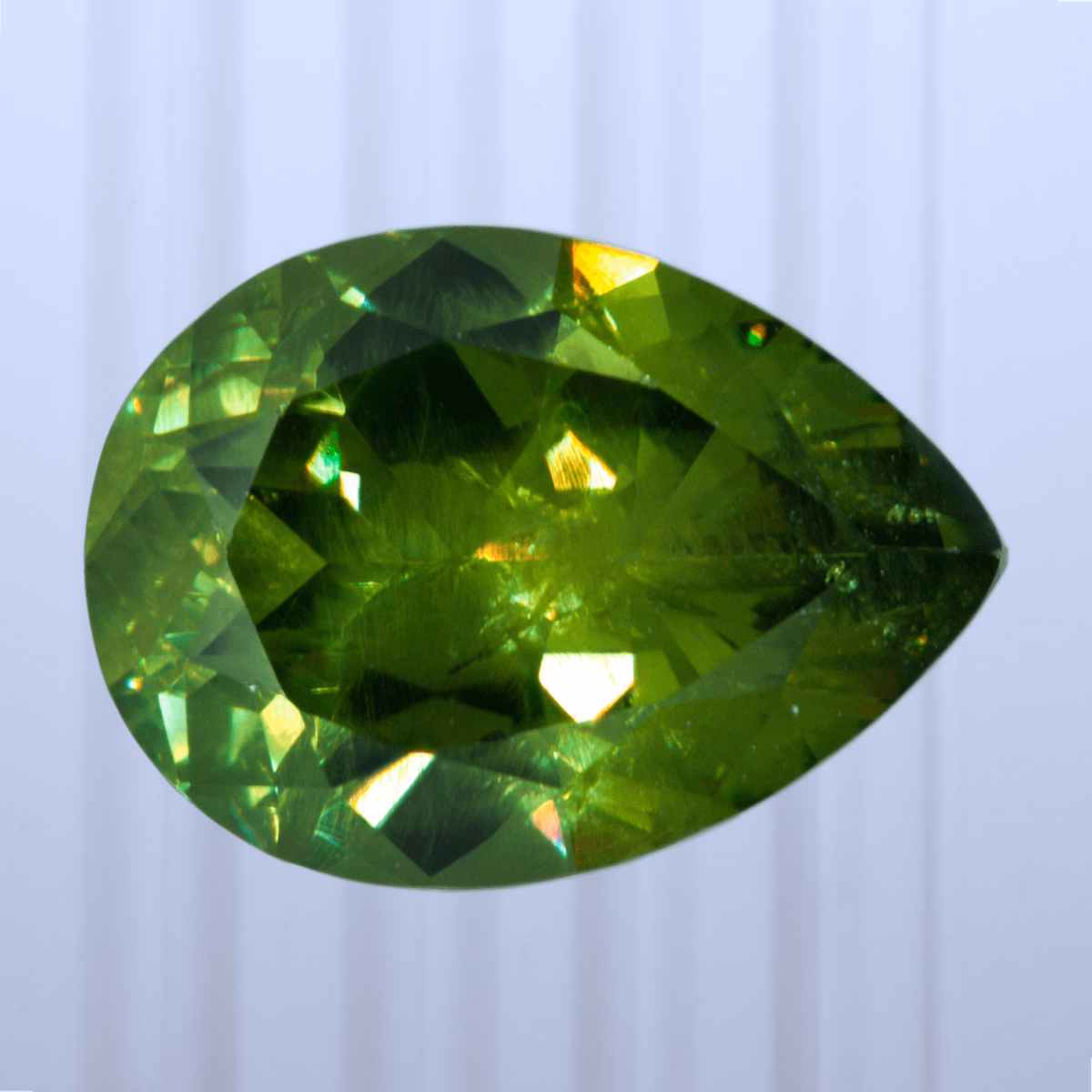 1.38 ct Demantoid, Russia, Unheated/Untreated, Pear Cut, photo 1 of 4