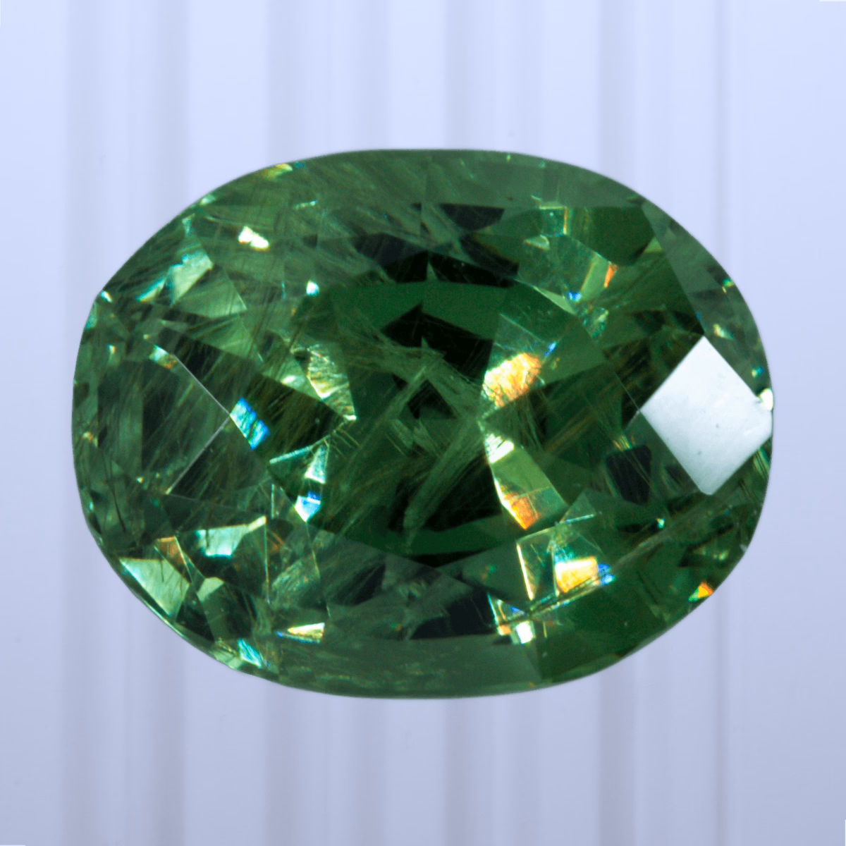 1.24 ct Demantoid, Russia, Unheated/Untreated, Oval Cut, photo 1 of 4