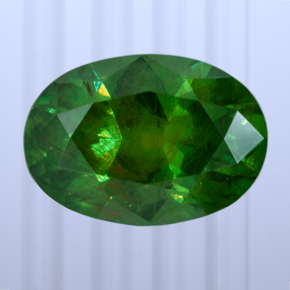 1.13 ct Demantoid, Russia, Unheated/Untreated, Oval Cut, photo 1 of 4