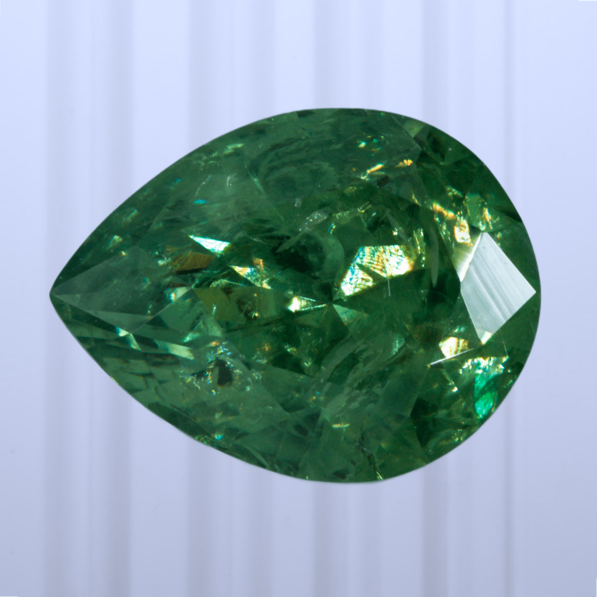 1.44 ct Demantoid, Russia, Unheated/Untreated, Pear Cut, photo 1 of 4