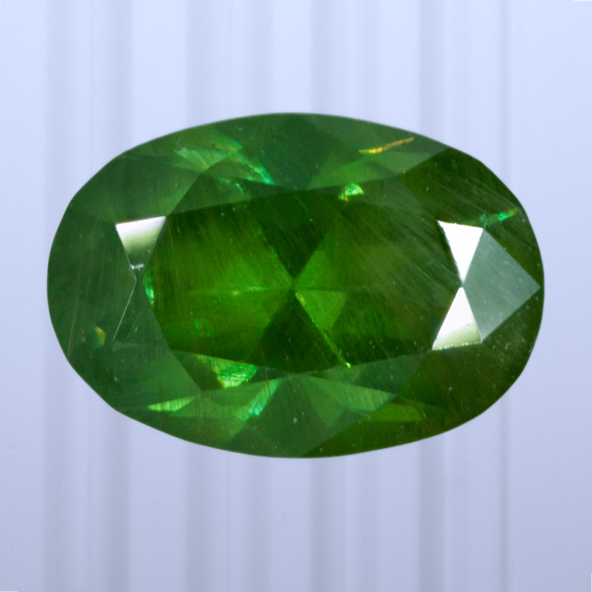 1.09 ct Demantoid, Russia, Unheated/Untreated, Oval Cut, photo 1 of 4