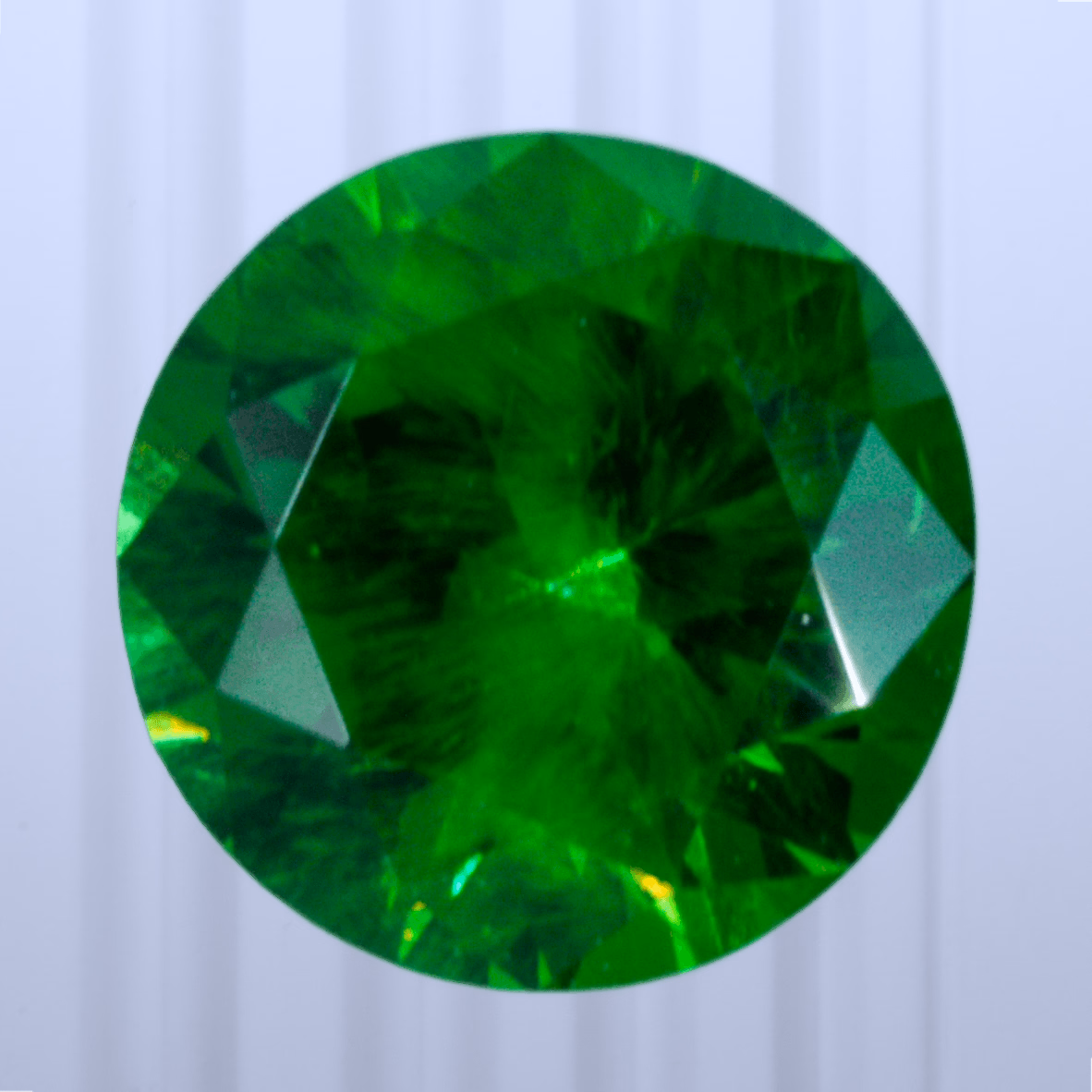 0.50 ct Demantoid, Russia, Unheated/Untreated, Round Cut, photo 1 of 4