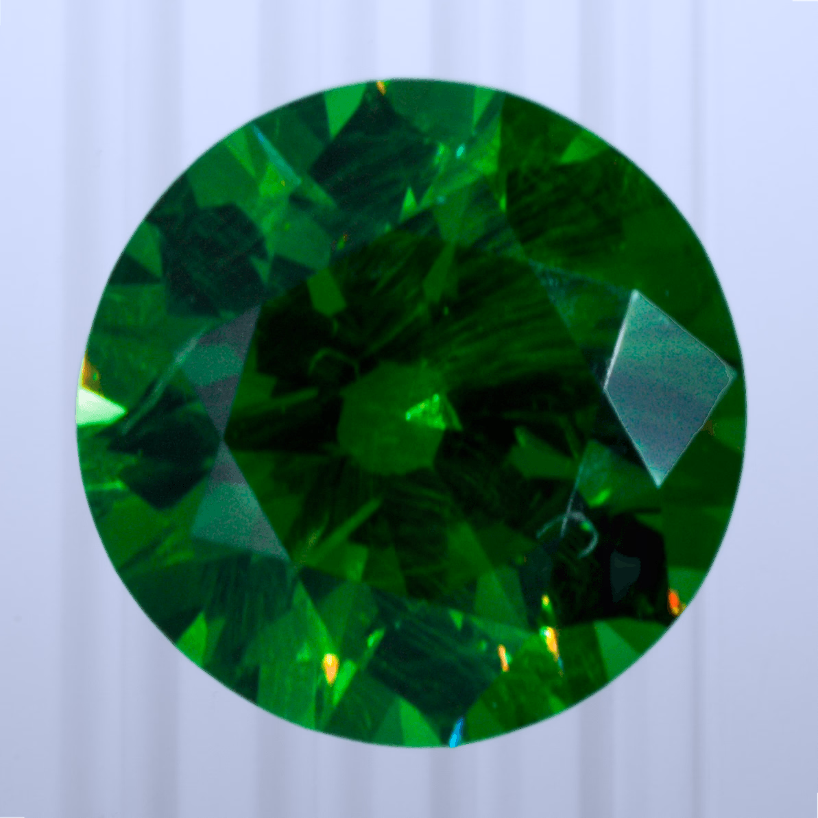 0.58 ct Demantoid, Russia, Unheated/Untreated, Round Cut, photo 1 of 4
