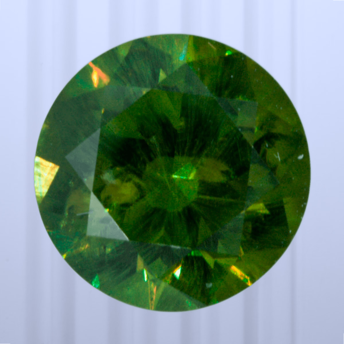 1.27 ct Demantoid, Russia, Unheated/Untreated, Round Cut, photo 1 of 4