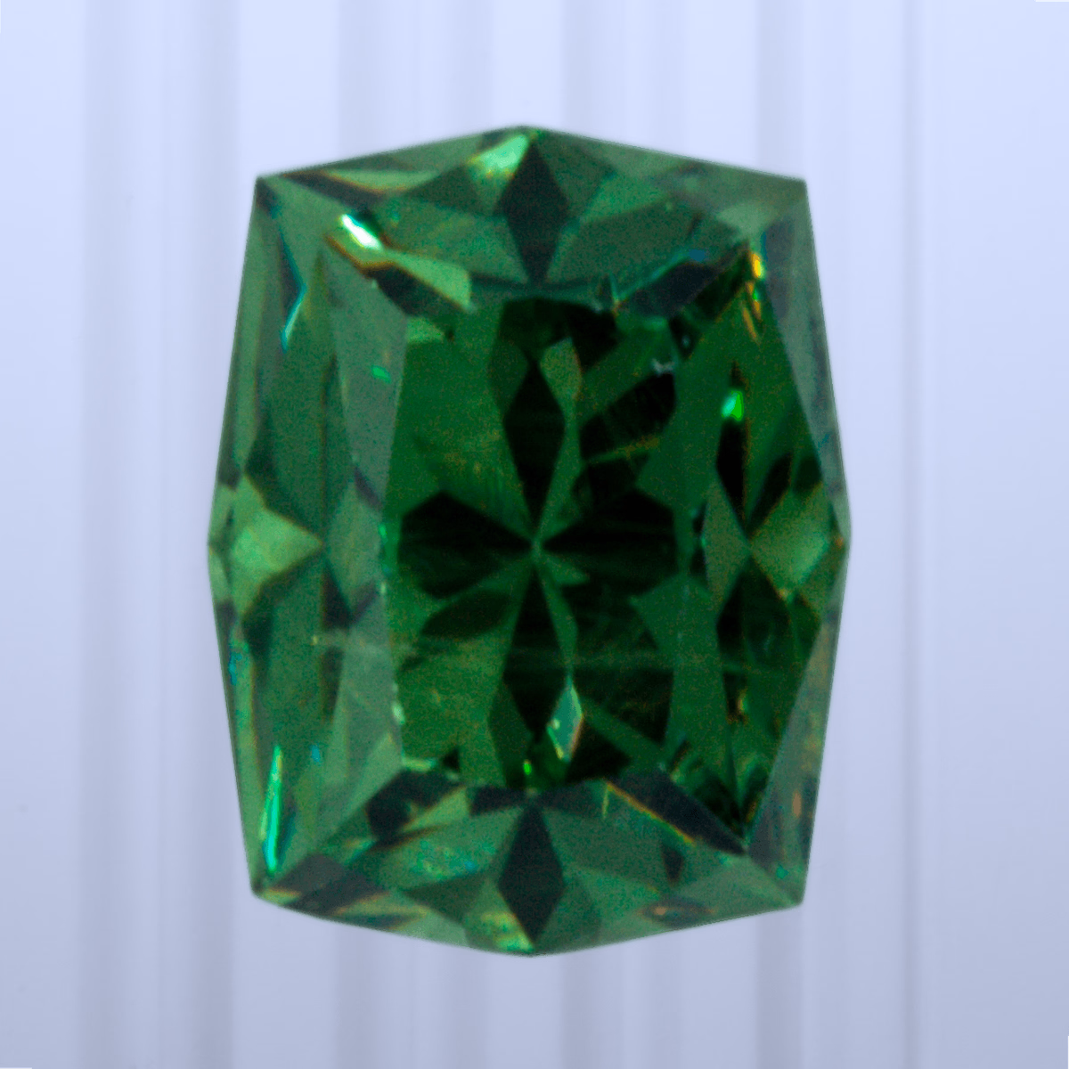 0.61 ct Demantoid, Russia, Unheated/Untreated, Emerald Cut, photo 1 of 5