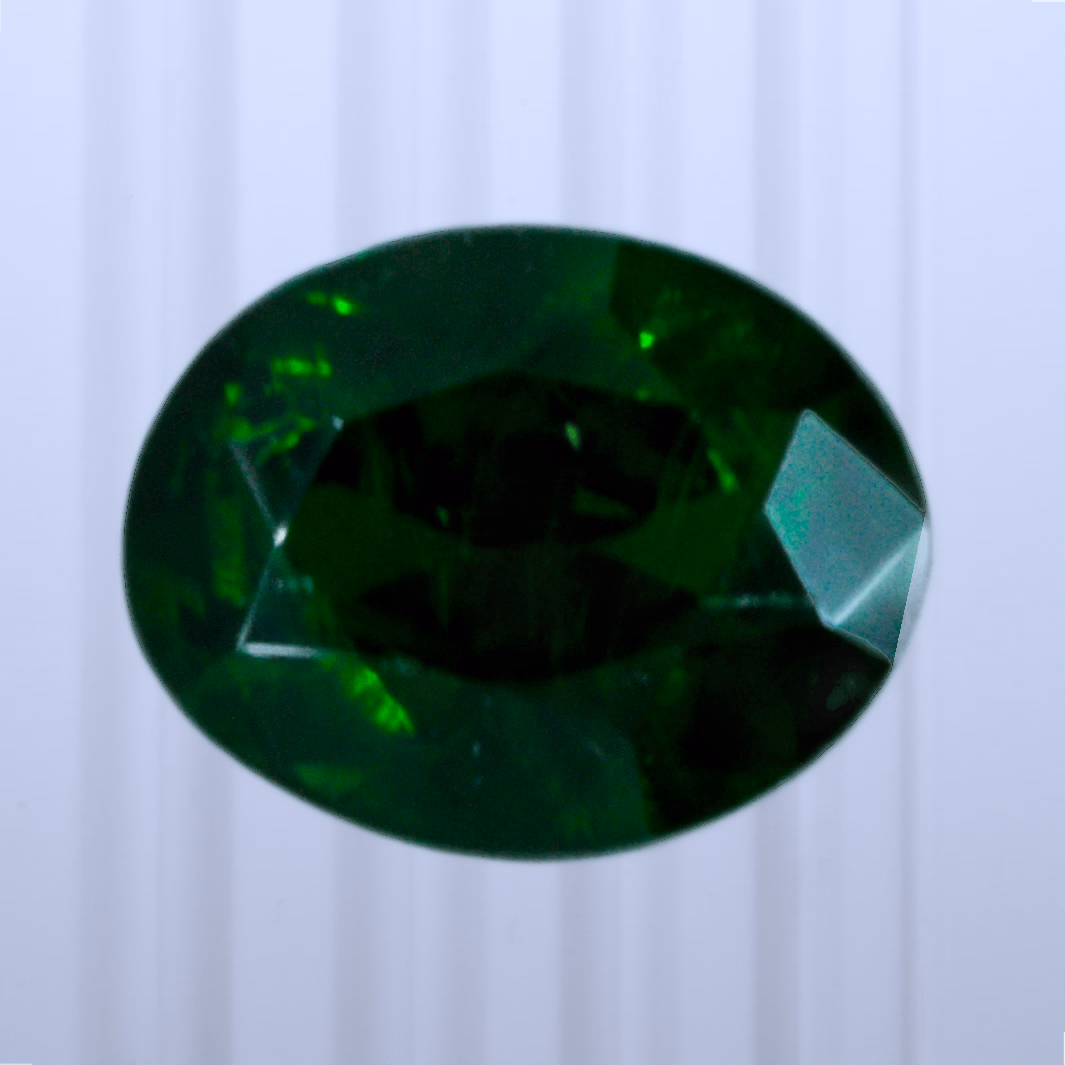 0.20 ct Demantoid, Russia, Unheated/Untreated, Oval Cut, photo 1 of 5