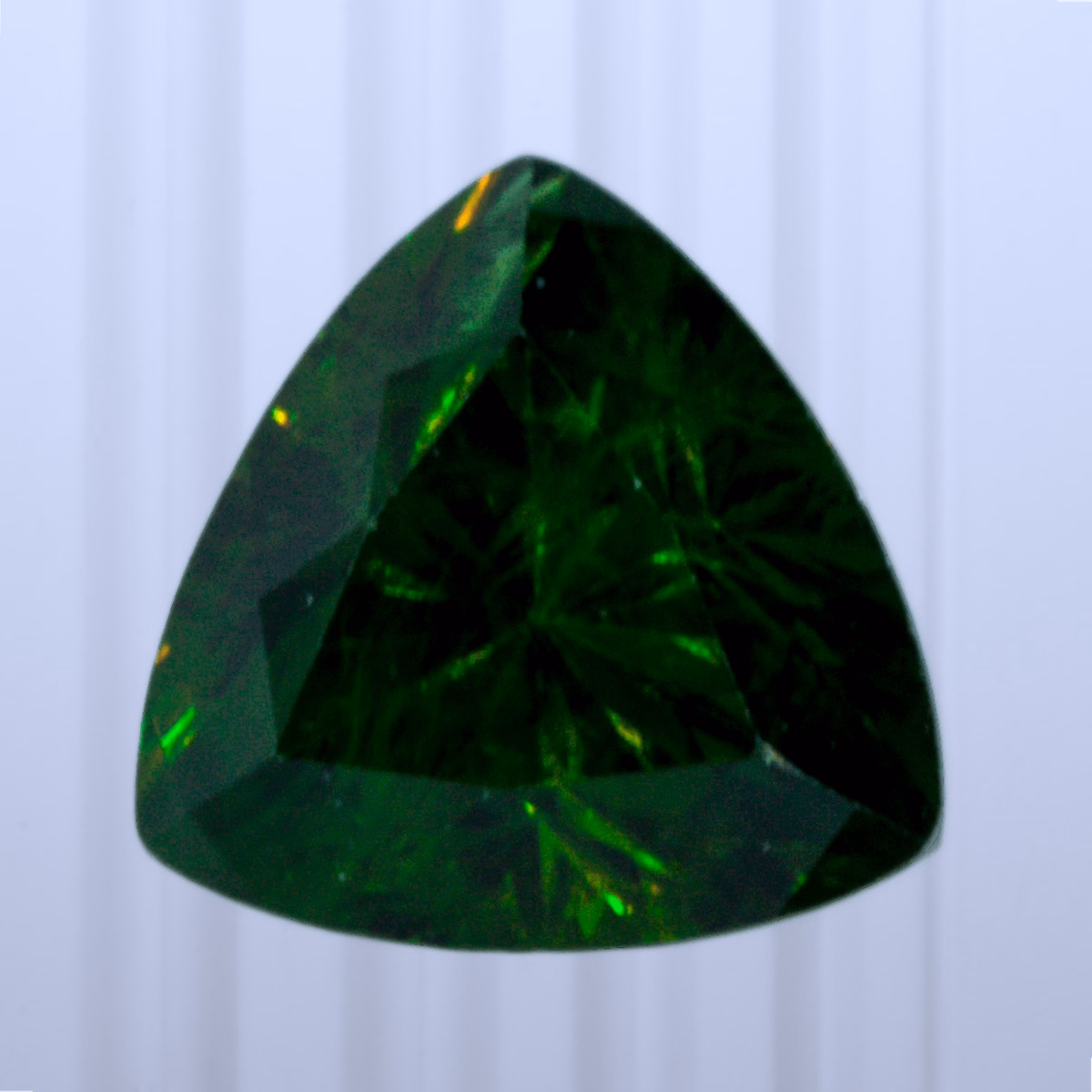 0.48 ct Demantoid, Russia, Unheated/Untreated, Trillion Cut, photo 1 of 4
