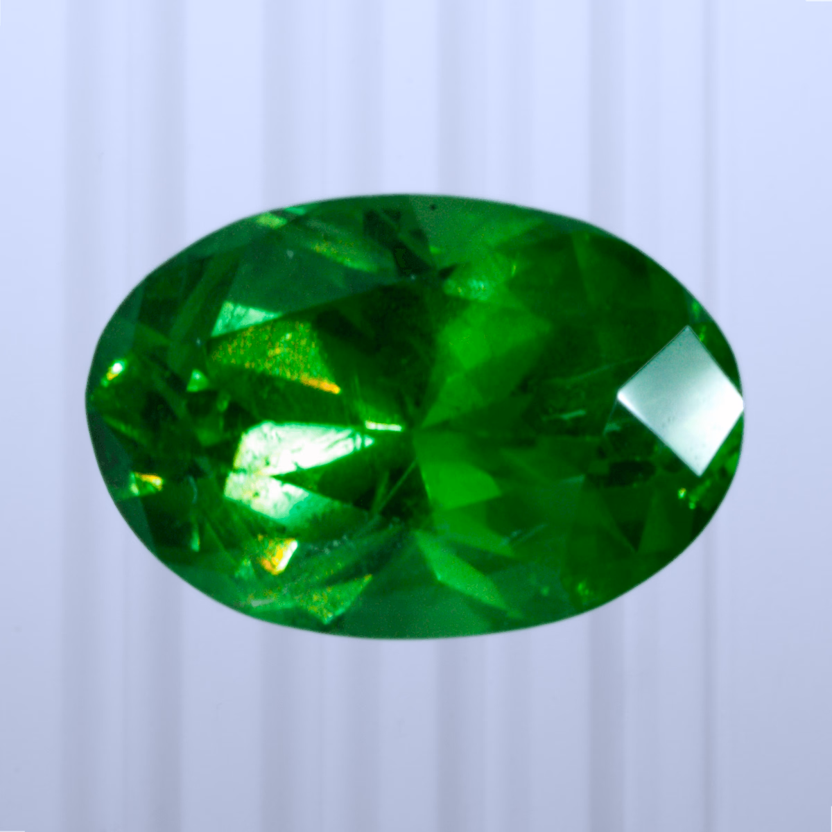 0.54 ct Demantoid, Russia, Unheated/Untreated, Oval Cut, photo 1 of 5