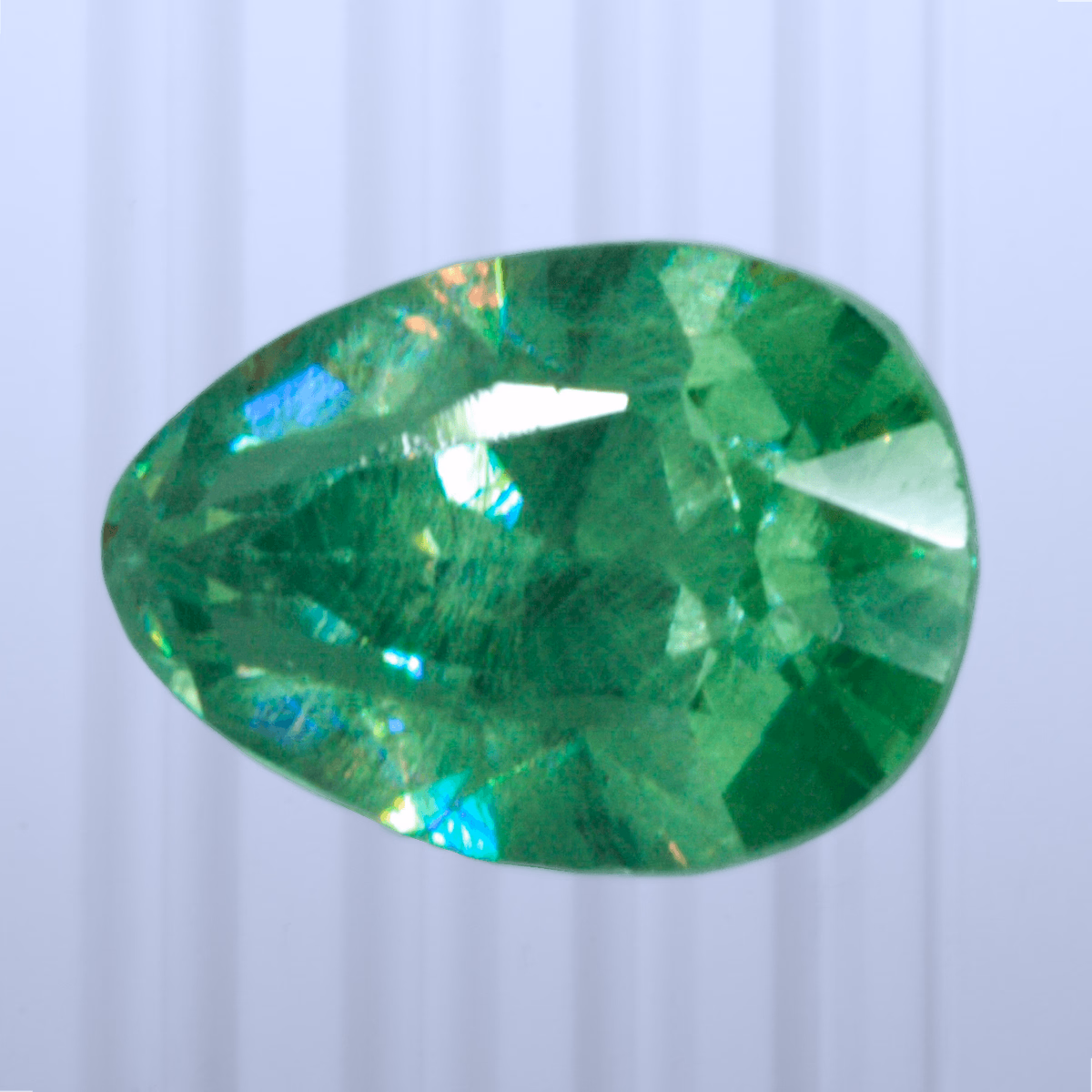 0.54 ct Demantoid, Russia, Unheated/Untreated, Pear Cut, photo 1 of 4