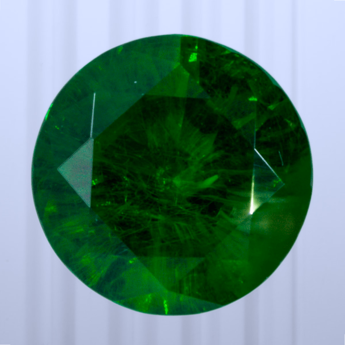0.66 ct Demantoid, Russia, Unheated/Untreated, Round Cut, photo 1 of 4