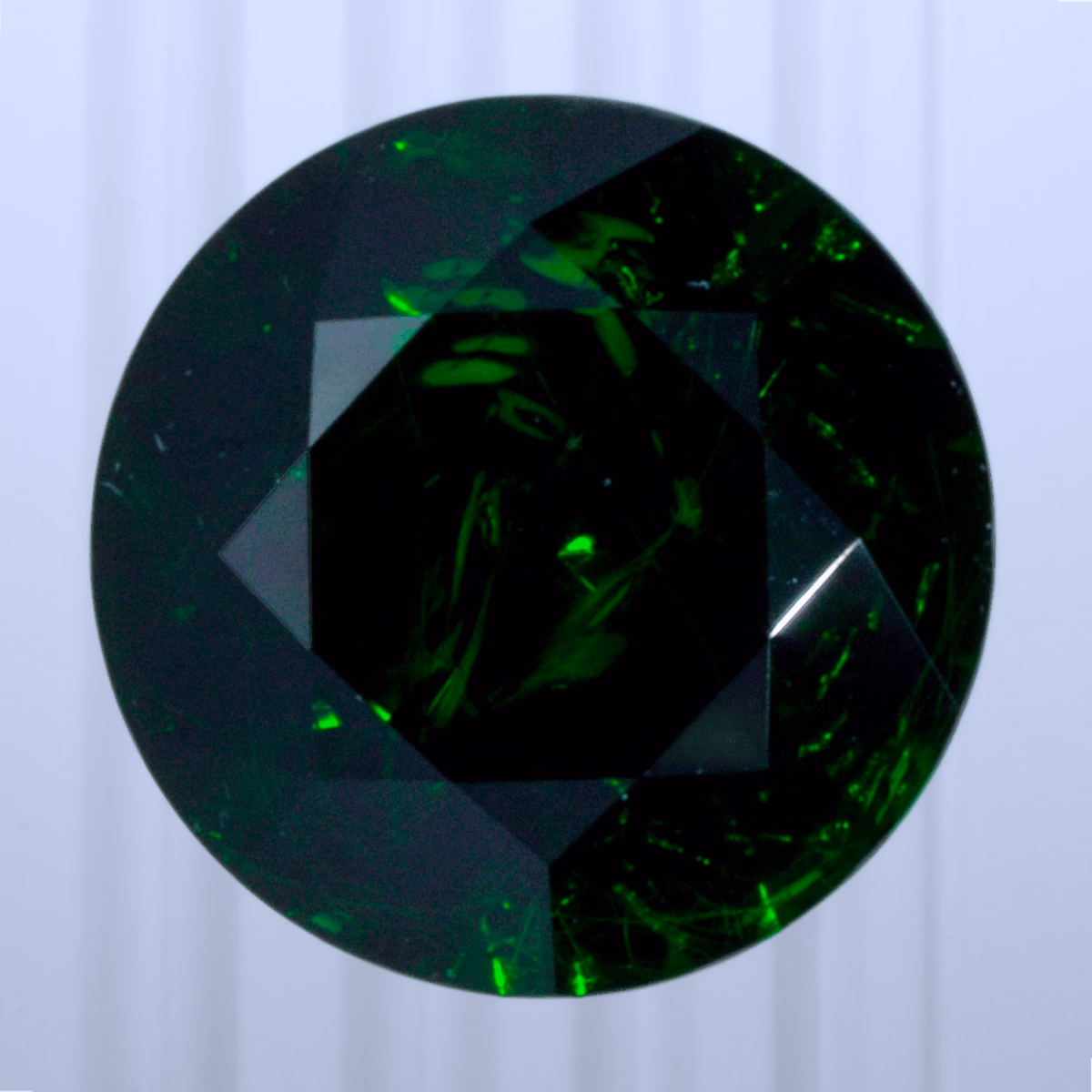 0.86 ct Demantoid, Russia, Unheated/Untreated, Round Cut, photo 1 of 5
