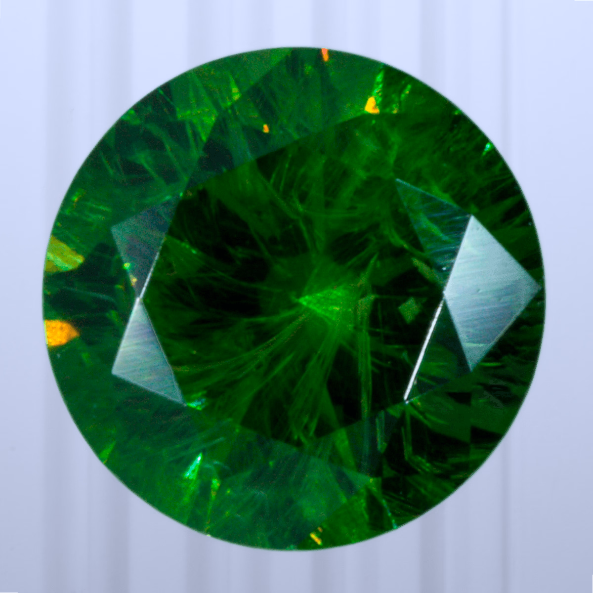 0.74 ct Demantoid, Russia, Unheated/Untreated, Round Cut, photo 1 of 4