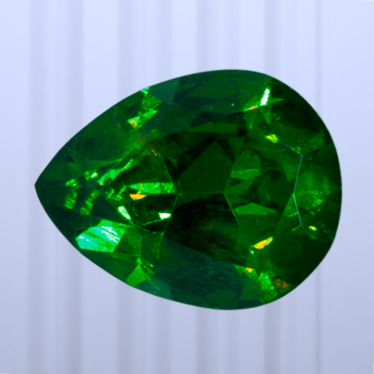 0.64 ct Demantoid, Russia, Unheated/Untreated, Pear Cut, photo 1 of 4