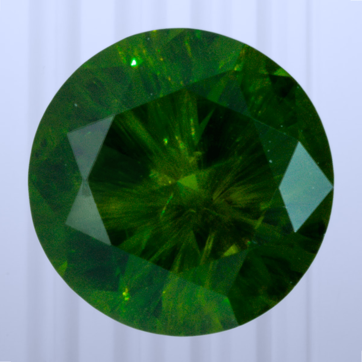 0.98 ct Demantoid, Russia, Unheated/Untreated, Round Cut, photo 1 of 4