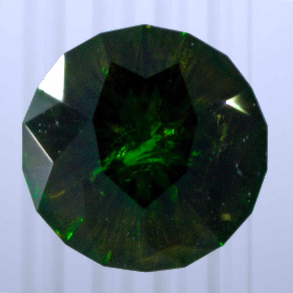0.82 ct Demantoid, Russia, Unheated/Untreated, Round Cut, photo 1 of 4