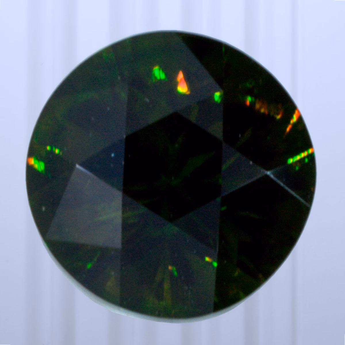 0.86 ct Demantoid, Russia, Unheated/Untreated, Round Cut, photo 1 of 4