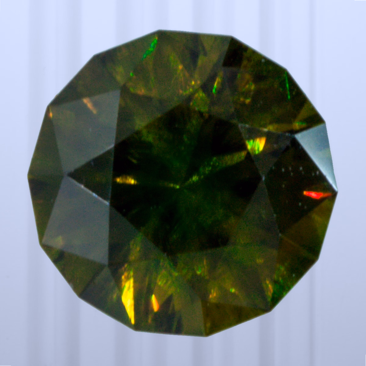 0.77 ct Demantoid, Russia, Unheated/Untreated, Round Cut, photo 1 of 4