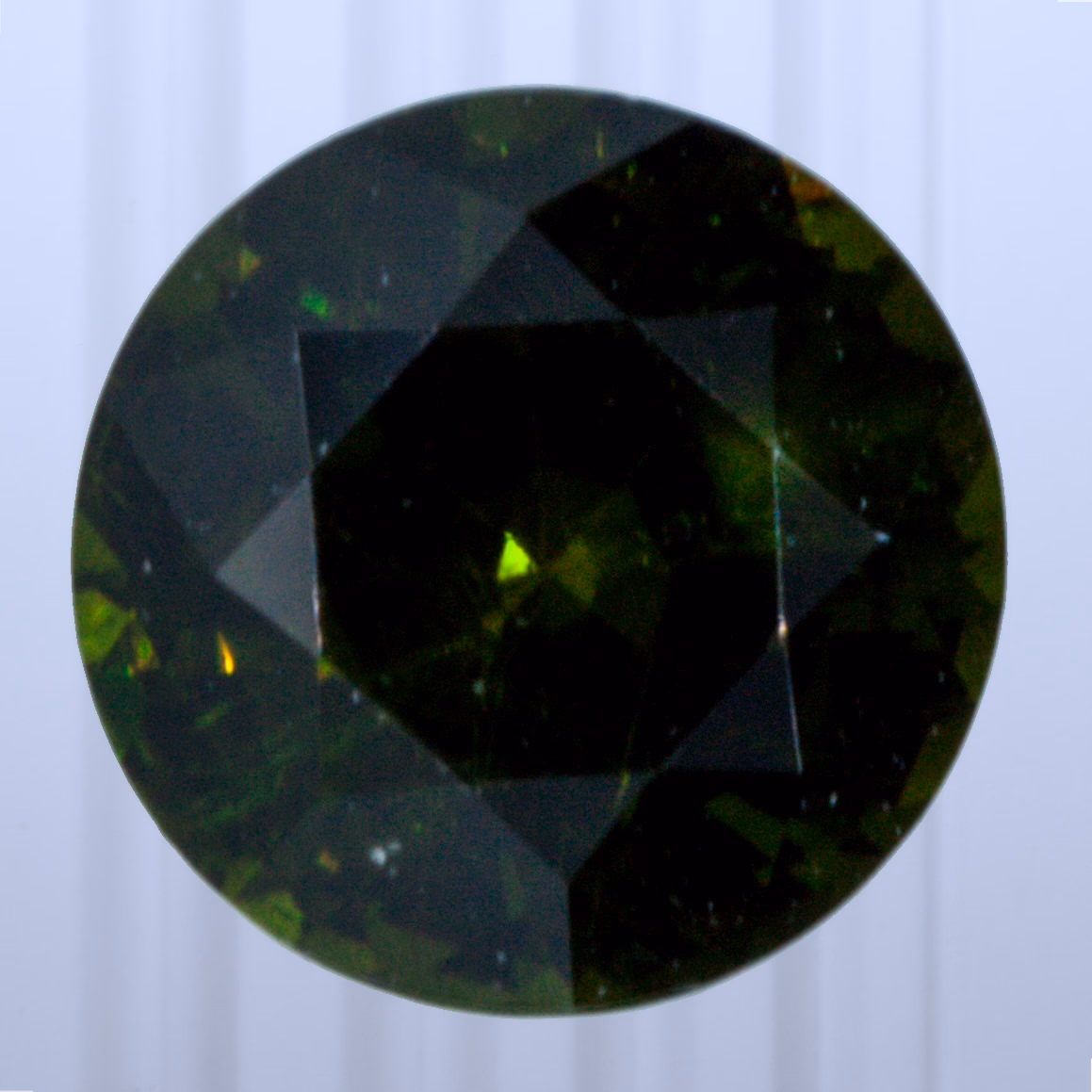 0.73 ct Demantoid, Russia, Unheated/Untreated, Round Cut, photo 1 of 4