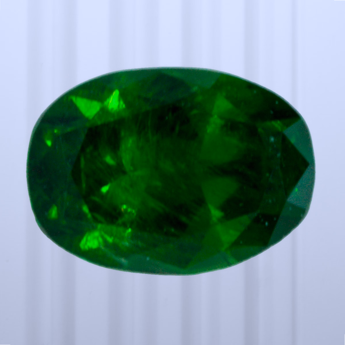 0.38 ct Demantoid, Russia, Unheated/Untreated, Oval Cut, photo 1 of 4