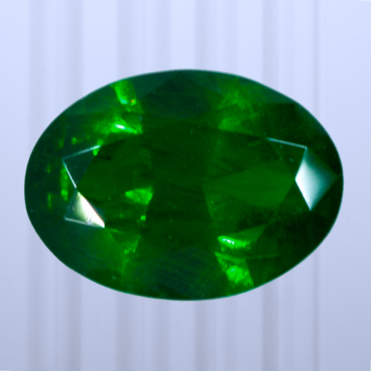 0.51 ct Demantoid, Russia, Unheated/Untreated, Oval Cut, photo 1 of 4