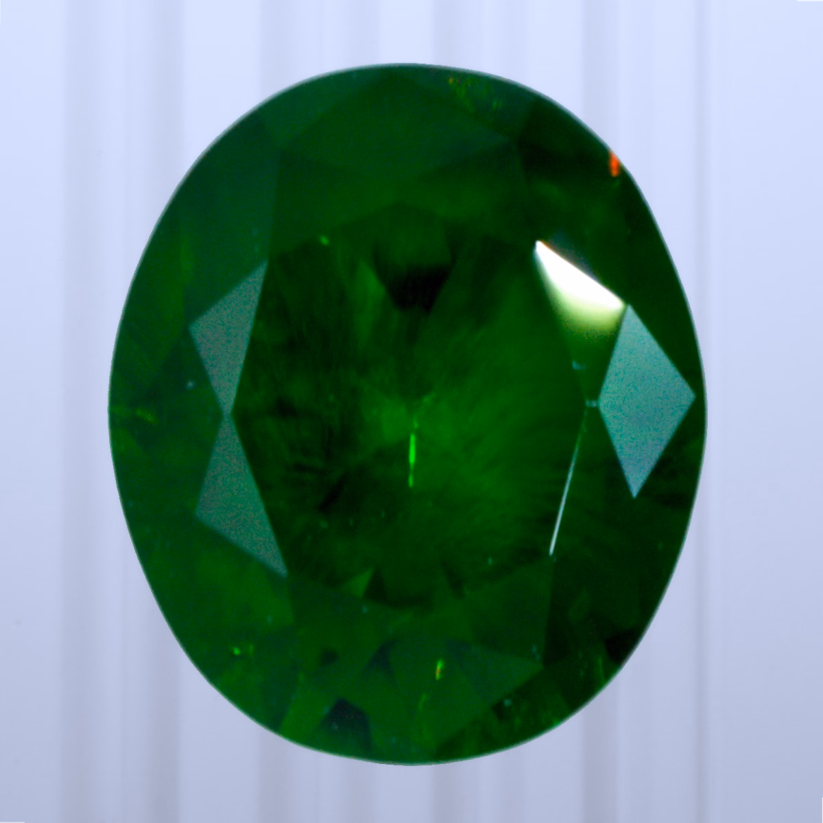 0.49 ct Demantoid, Russia, Unheated/Untreated, Oval Cut, photo 1 of 4