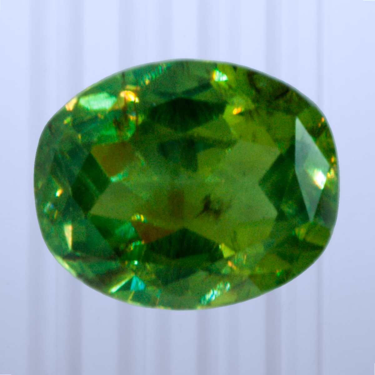 0.54 ct Demantoid, Russia, Unheated/Untreated, Cushion Cut, photo 1 of 4