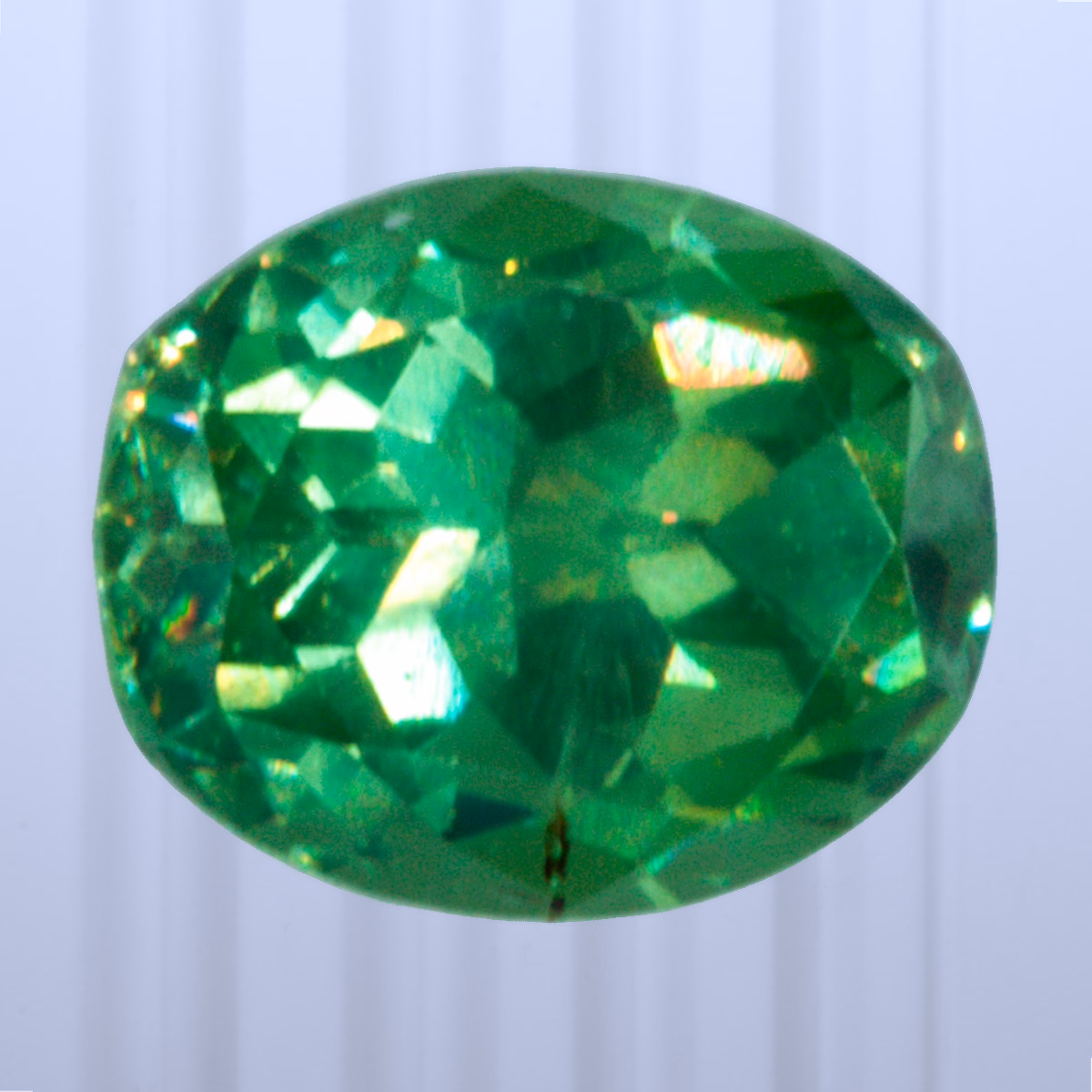 0.58 ct Demantoid, Russia, Unheated/Untreated, Cushion Cut, photo 1 of 4