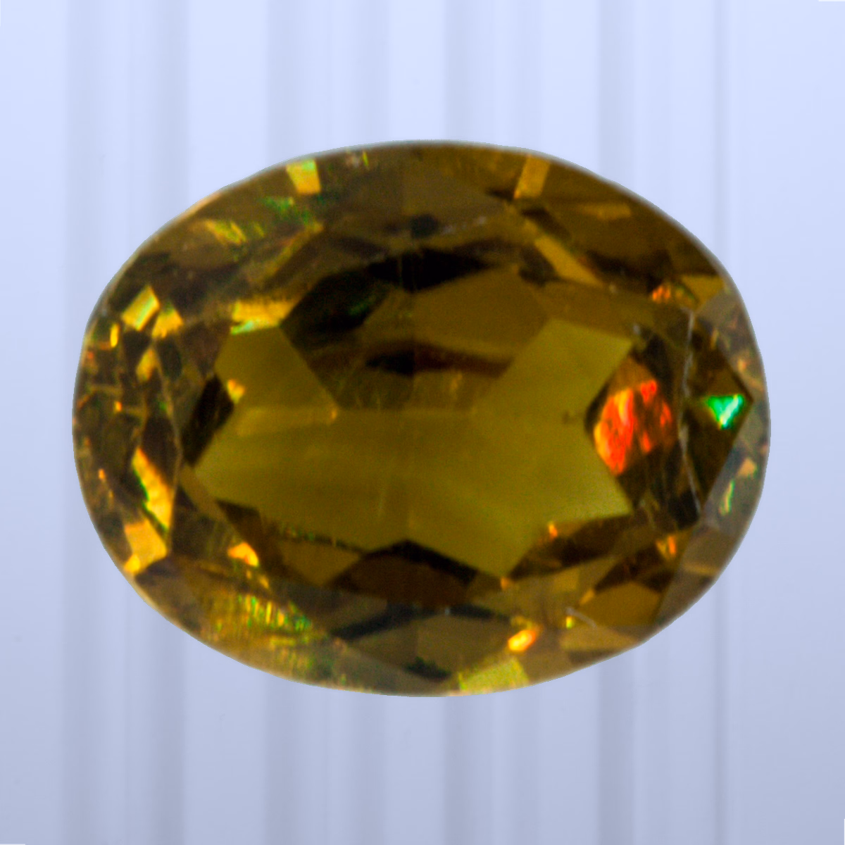 0.54 ct Topazolite, Russia, Unheated/Untreated, Oval Cut, photo 1 of 4