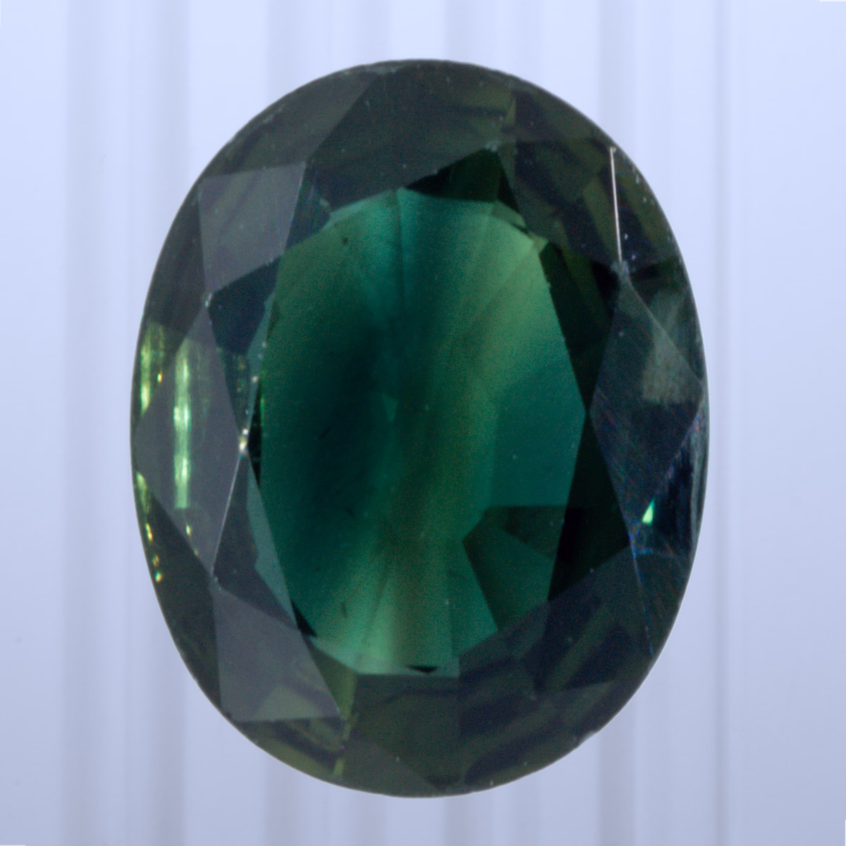 1.51 ct Teal Sapphire, Thailand, Heated, Oval Cut, photo 1 of 4