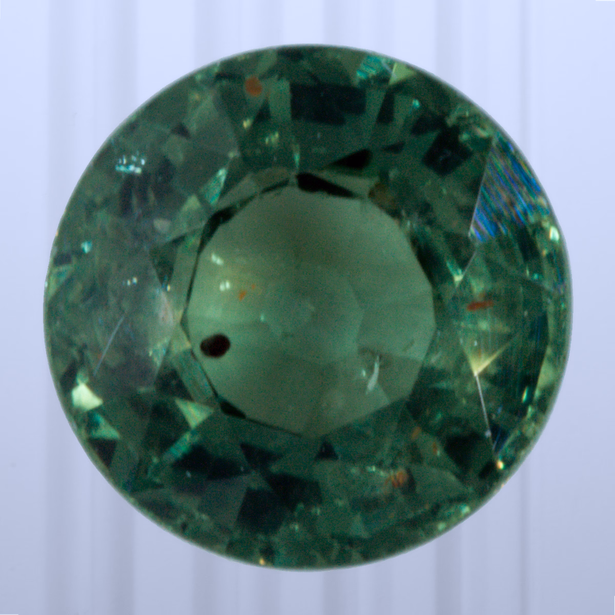 1.24 ct Bright Mint Green Sapphire, Sri Lanka (Ceylon), Heated, Round Cut, photo 1 of 4