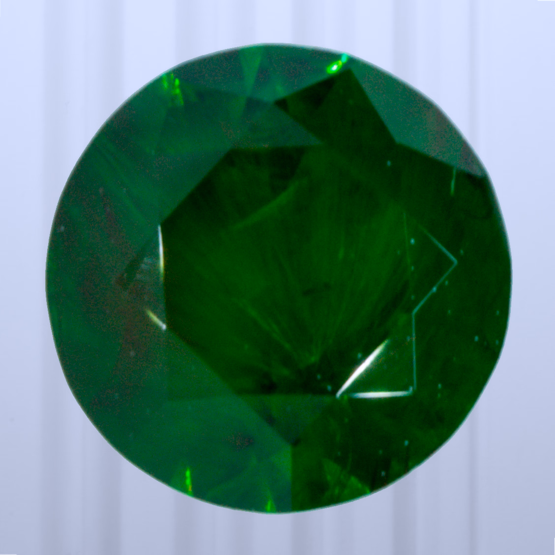 0.56 ct Demantoid, Russia, Unheated/Untreated, Round Cut, photo 1 of 4