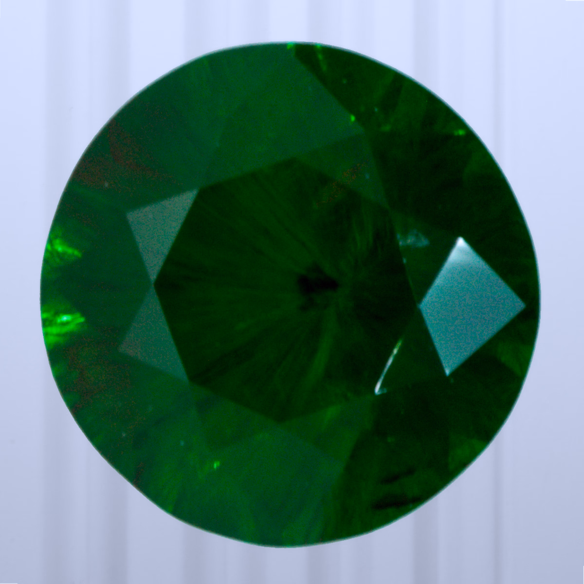 0.83 ct Demantoid, Russia, Unheated/Untreated, Round Cut, photo 1 of 4